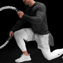 Laden Sie das Bild in den Galerie-Viewer, Herren Fitnessshorts - mit Elasthan Leggings
